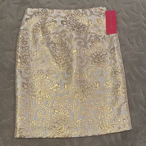 Never been worn Sunny Leigh pencil skirt! Gorgeous ornate gold print.